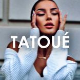 Tatoué