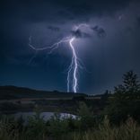 Under the Shadow of the Mountain