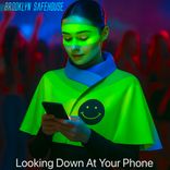 Portada para "Looking Down At Your Phone"
